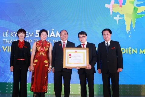 Báo Vietnam+ đón nhận Huân chương Lao động hạng Ba
