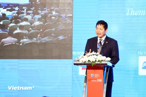 Ông Trương Gia Bình, Chủ tịch VINASA phát biểu tại sự kiện. (Ảnh: Minh Quyết/Vietnam+)