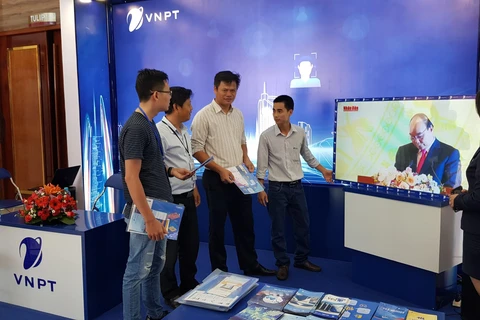 Gian hàng với nhiều giải pháp công nghệ của VNPT tại triển lãm. (Ảnh: C.Hưng/Vietnam+)