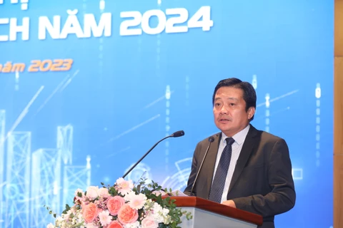 Tổng Giám đốc VNPT Huỳnh Quang Liêm cho hay kết quả đạt được năm 2023 không chỉ cho thấy những nỗ lực rất lớn của tập VNPT trong bối cảnh đầy khó khăn mà còn là tiền đề, tạo động lực để VNPT đặt ra các mục tiêu mới cho năm tiếp theo. (Ảnh: Minh Quyết/Vietnam+)