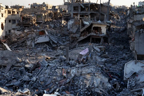 Cảnh đổ nát tại Shejaiya (Dải Gaza) sau một đợt oanh kích của máy bay Israel. (Nguồn: AFP/TTXVN)