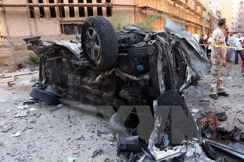 Hiện trường một vụ đánh bom ở Tripoli. (Nguồn: THX/TTXVN)