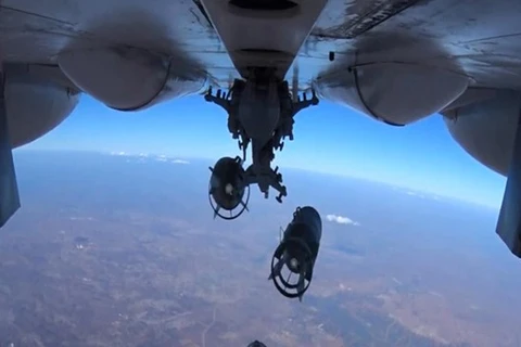Bom đạn của Không quân Nga ném xuống Syria (Nguồn: RT)
