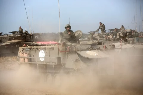 Binh sỹ Israel trong cuộc tập trận gần khu vực biên giới Israel-Gaza. (Nguồn: AFP/TTXVN)