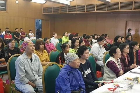 Các bệnh nhân tham gia buổi ra mắt câu lạc bộ bệnh nhân ung thư vú. (Ảnh: PV/Vietnam+)