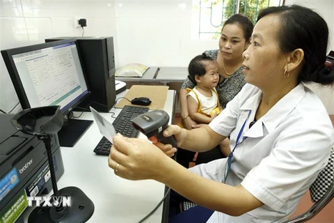 Hệ thống thông tin giám định bảo hiểm y tế vào vận hành, kết nối gần 100% cơ sở khám, chữa bệnh bảo hiểm y tế. (Ảnh: TTXVN/Vietnam+