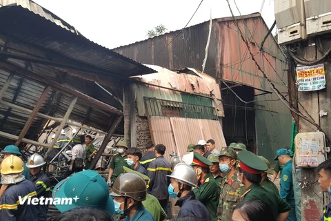 Hiện trường vụ cháy tại Trung Văn, Nam Từ Liêm, Hà Nội làm 8 người tử vong và mất tích. (Nguồn: PV/Vietnam+)