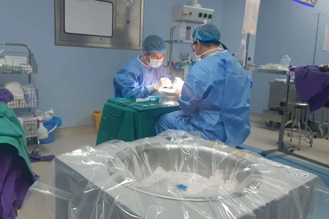 Các y bác sỹ thực hiện thành công ca điều phối ghép đa tạng từ một người hiến ở Vũng Tàu. (Ảnh: PV/Vietnam+)