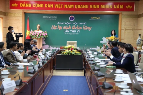 Bộ trưởng Bộ Y tế Đào Hồng Lan phát biểu chỉ đạo tại Lễ phát động cuộc thi viết "Sự hy sinh thầm lặng". (Ảnh: PV/Vietnam+)