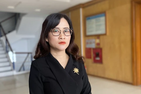 Bà Trần Thị Trang - Vụ trưởng Vụ Bảo hiểm Y tế. (Ảnh: PV/Vietnam+)