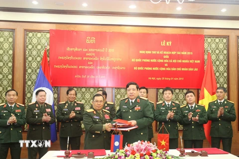 Bộ Quốc phòng Việt-Lào ký Nghị định thư và Kế hoạch hợp tác 2015