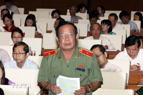 Đại biểu Quốc hội thành phố Cần Thơ Nguyễn Minh Kha phát biểu ý kiến. (Ảnh: Nguyễn Dân/TTXVN)