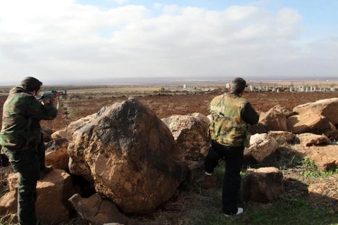 Binh lính Syria tại căn cứ ở tỉnh Sweida . (Nguồn: AFP)
