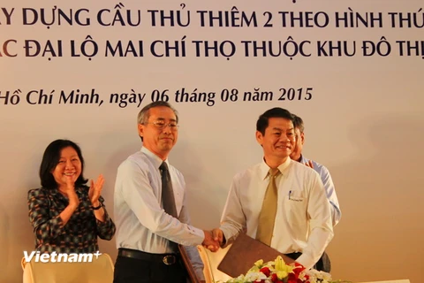 Quang cảnh lễ ký kết tài trợ tín dụng giữa BIDV và Công ty cổ phần Đại Quang Minh. (Ảnh: Trần Xuân Tình/Vietnam+)