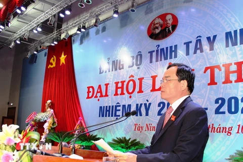 Bí thư Tỉnh ủy Tây Ninh Trần Lưu Quang phát biểu nhận nhiệm vụ tại phiên bế mạc Đại hội. (Ảnh: Lê Đức Hoảnh/TTXVN)