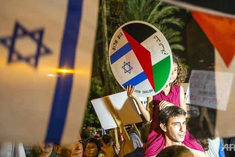 Người dân Israel tuần hành để ủng hộ các cuộc hòa đàm mới giữa Israel và Palestine. (Nguồn: AFP)