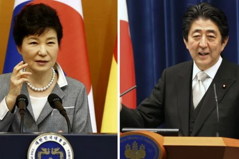 Tổng thống Hàn Quốc Park Geun-hye và Thủ tướng Nhật Bản Shinzo Abe. (Nguồn: AP)