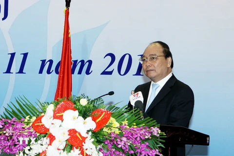 Phó Thủ tướng Nguyễn Xuân Phúc dự và phát biểu tại hội nghị. (Ảnh: Nguyễn Dân/TTXVN)