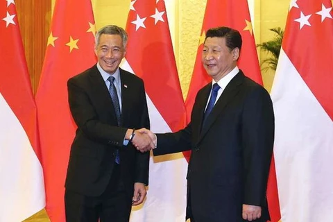 Chủ tịch Trung Quốc Tập Cận Bình và Thủ tướng Singapore Lý Hiển Long. (Nguồn: straitstimes.com)