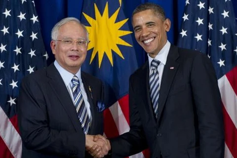 Tổng thống Mỹ Barack Obama và Thủ tướng Malaysia Najib Razak trong một cuộc gặp tháng 11/2011. (Nguồn: AFP)