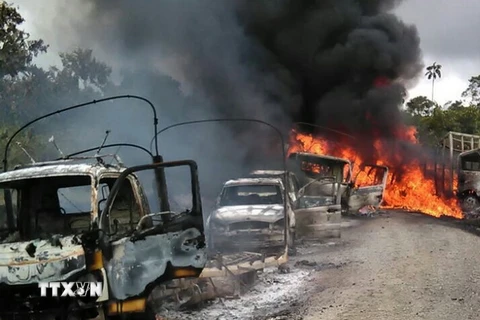 Hiện trường vụ đốt cháy xe ở Antioquia mà ELN bị nghi là thủ phạm. (Nguồn: AFP/TTXVN)