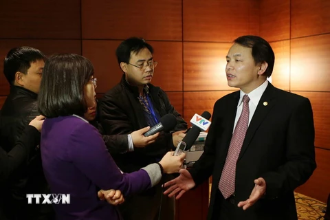 Phó Chánh văn phòng Trung ương Đảng Lê Quang Vĩnh trả lời phỏng vấn báo chí chiều 24/1. (Nguồn: TTXVN)