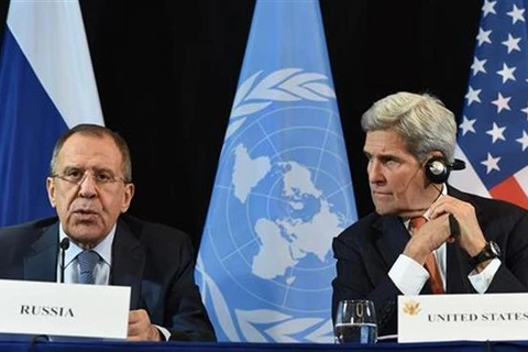Ngoại trưởng Nga Sergei Lavrov và người đồng cấp Mỹ John Kerry trong một cuộc họp báo sau cuộc họp của ISSG tại Munich, Đức. (Nguồn: AFP)