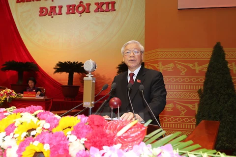 Tổng Bí thư Nguyễn Phú Trọng đọc Báo cáo của Ban Chấp hành Trung ương Đảng khóa XI về các văn kiện trình Đại hội XII của Đảng. (Nguồn: TTXVN)