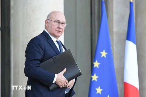 Bộ trưởng Tài chính Pháp Michel Sapin sau cuộc họp Hội đồng Bộ trưởng Pháp ở thủ đô Paris ngày 20/1. (Nguồn: AFP/TTXVN)