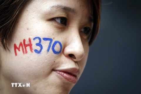 Người thân của các nạn nhân trên chiếc máy bay xấu số MH370 tham gia lễ tưởng niệm hai năm ngày máy bay mất tích, ở thủ đô Kuala Lumpur, Malaysia. (Nguồn: THX/TTXVN)