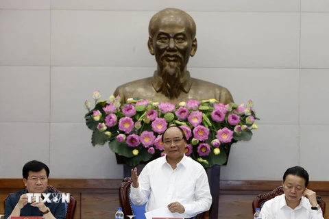 Thủ tướng Nguyễn Xuân Phúc chủ trì phiên họp Ủy ban Quốc gia về biến đổi khí hậu lần thứ 7. (Ảnh: Thống Nhất/TTXVN)