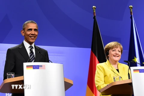 Thủ tướng Đức Angela Merkel (phải) và Tổng thống Mỹ Barack Obama tại buổi họp báo chung sau cuộc hội đàm ở Hannover. (Nguồn: AFP/TTXVN)