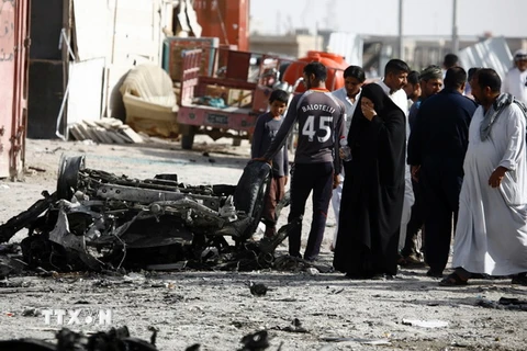 Hiện trường một vụ đánh bom ở miền Nam Iraq. (Nguồn: AFP/TTXVN)