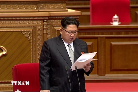 Nhà lãnh đạo Triều Tiên Kim Jong-Un đọc bài ca ngợi thành tựu công nghệ hạt nhân tại Đại hội Đảng. (Nguồn: Yonhap/TTXVN)
