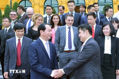 Chủ tịch nước Trần Đại Quang với các đại biểu doanh nghiệp Brunei. (Ảnh: Nhan Sáng/TTXVN)