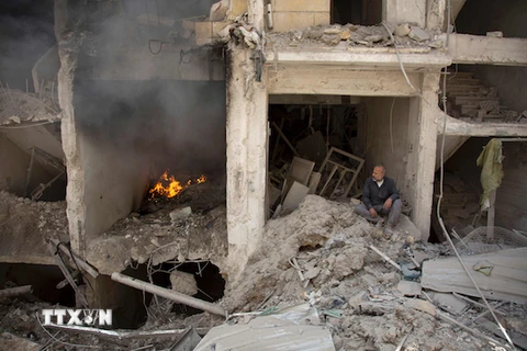 Cảnh đổ nát do xung đột tại Aleppo, Syria. (Nguồn: AFP/TTXVN)