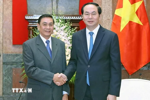 Chủ tịch nước Trần Đại Quang tiếp Chủ nhiệm Văn phòng Chủ tịch nước Lào Khammeung Phongthady. (Ảnh: Nhan Sáng/TTXVN)