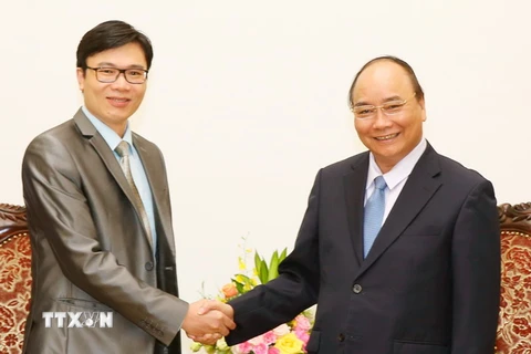Thủ tướng Nguyễn Xuân Phúc tiếp Giáo sư Nguyễn Đức Khương. (Ảnh: Thống Nhất/TTXVN)