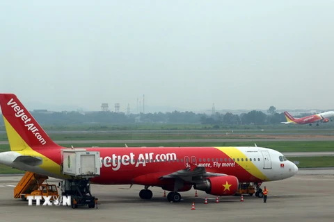 Máy bay của Vietjet Air đi từ sân bay quốc tế Nội Bài (Hà Nội). (Ảnh: Huy Hùng/TTXVN)
