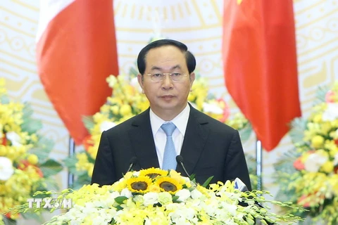 Chủ tịch nước Trần Đại Quang đọc Diễn văn tại buổi chiêu đãi. (Ảnh: Nhan Sáng/TTXVN)