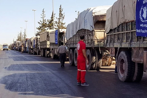 Đoàn xe cứu trợ chuẩn bị lên đường đến Aleppo. (Nguồn: EPA)