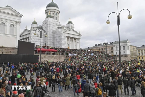 Quang cảnh cuộc biểu tình tại Helsinki, Phần Lan. (Nguồn: EPA/TTXVN)