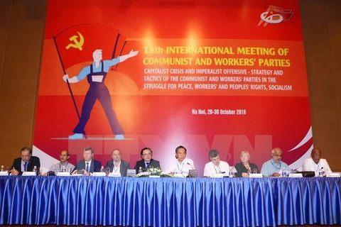 Đoàn Chủ tịch Cuộc gặp quốc tế các đảng cộng sản và công nhân. (Ảnh : Doãn Tấn/TTXVN)