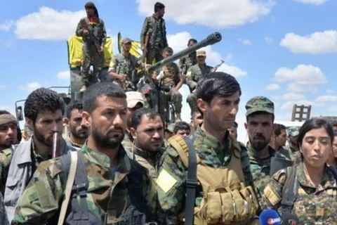 Các tay súng thuộc Lực lượng Dân chủ Syria (SDF). (Nguồn: SDF)
