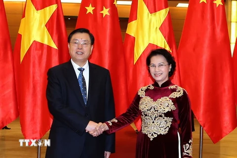 Chủ tịch Quốc hội Nguyễn Thị Kim Ngân đón tiếp Chủ tịch Quốc hội Trung Quốc Trương Đức Giang. (Ảnh: Trọng Đức/TTXVN)
