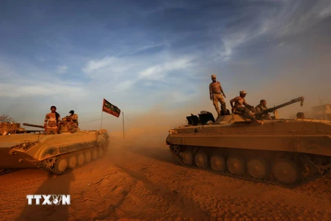 Lực lượng Iraq giành quyền kiểm soát một địa điểm ở làng Jarif, cách thành phố Mosul 45km về phía Nam. (Nguồn: AFP/TTXVN)