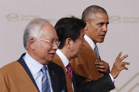 Tổng thống Mỹ Barack Obama và Thủ tướng Nhật Bản Shinzo Abe tại Hội nghị cấp cao APEC 24. (Nguồn: AP)
