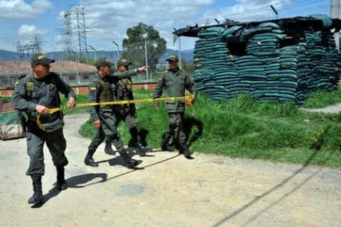 Cảnh sát Colombia đang làm nhiệm vụ. (Nguồn: au.news.yahoo.com)