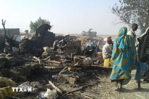 Hiện trường một vụ nổ ở Nigeria. (Nguồn: EPA/TTXVN)