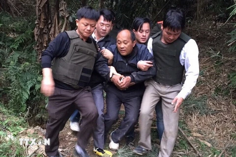 Đối tượng Hạng A Lau bị bắt giữ. (Nguồn: TTXVN)